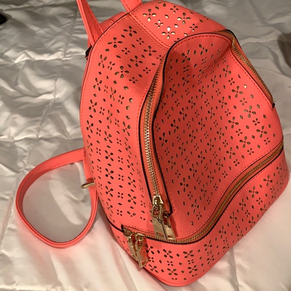 Other - A coral/pink leather mini backpack